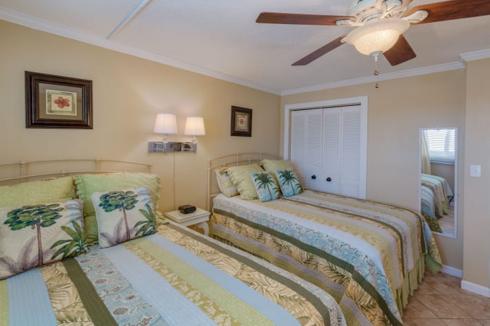 2nd bedroom has large double closet and full length mirror