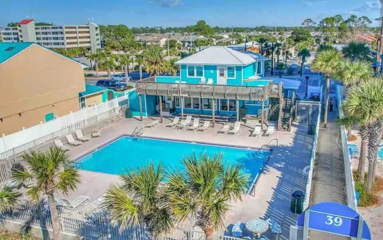 Swimming pool with restaurant right on the beach 