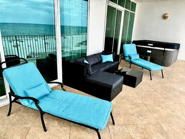 Outdoor Porch Area with Hot Tub and Gas Grill 