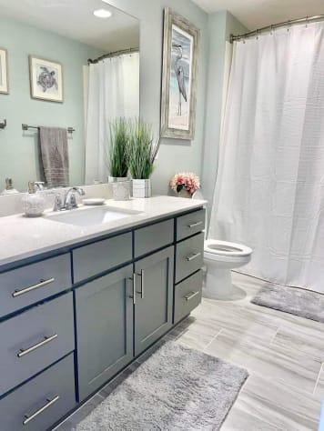 Guest bathroom has shower tub combo