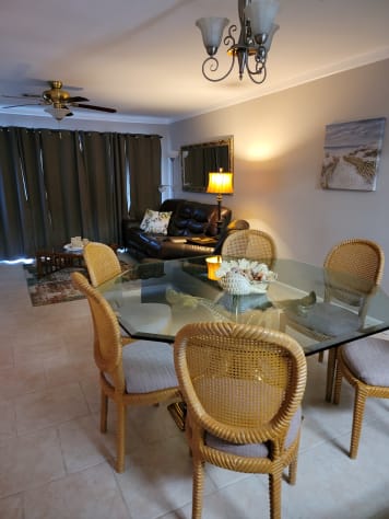 View of the dining room and living room from the kitchen.  