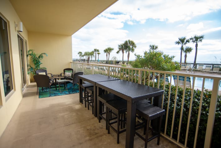 Enjoy poolside/Gulfside dining, suited for 8 (more comfortable for 6) 