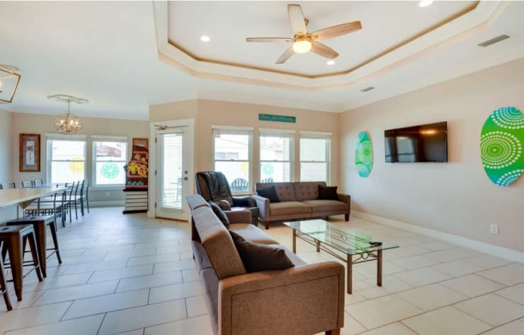 The great room is the perfect gathering place for movies and conversation