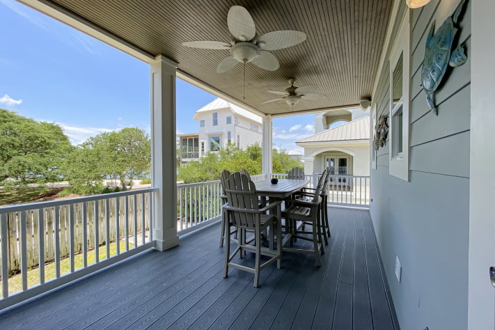 Back Porch with dining table and chairs