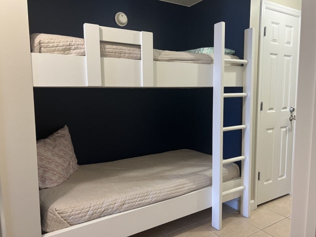 Two Bunks beds in the hallway.