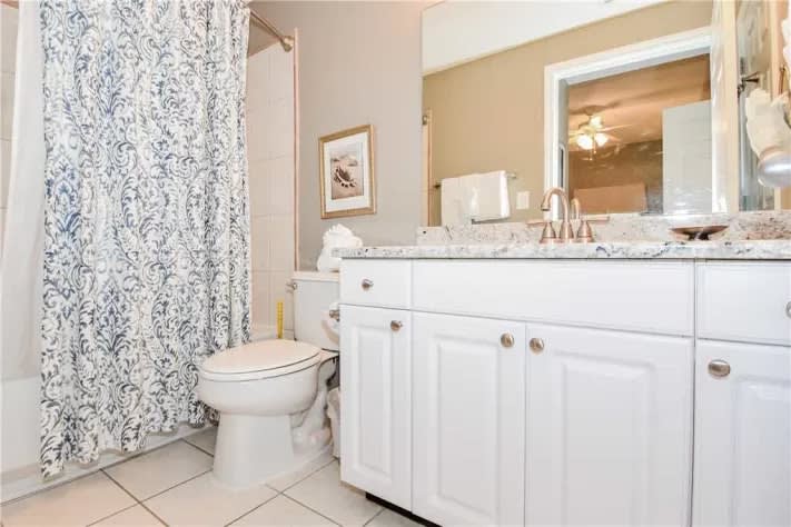 Guest bedroom bath has access from bedroom and the hallway