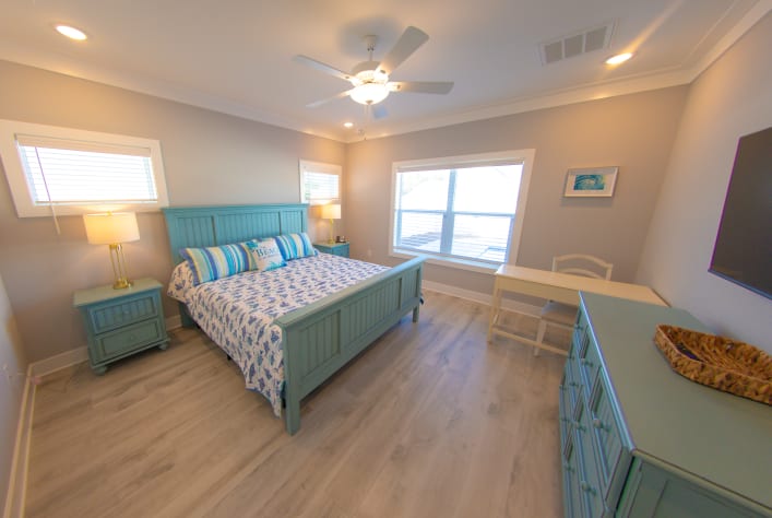 Master bedroom-desk, charge station, walk in closet, bathroom w walk-in shower.