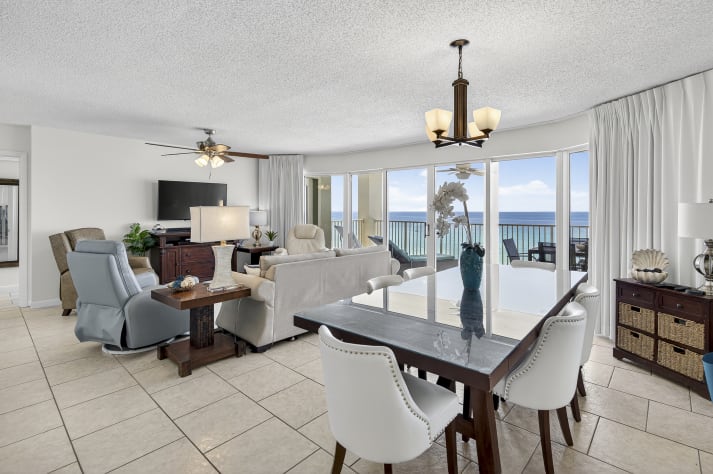 Living Room/Dining Room with floor to ceiling views of the Gulf.  Free WIFI and Direct TV plus Roku.