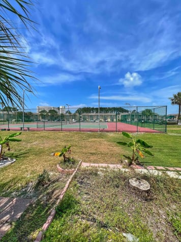 Patio view, few steps to swimming pool and tennis 