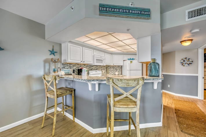 Bar area with high top chairs