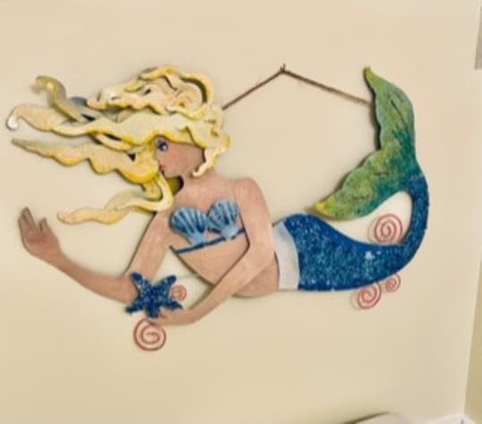 Beautiful crystal Mermaid gliding through the 1/2 bath