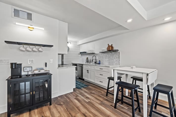 Spacious living room, coffee station, full kitchen