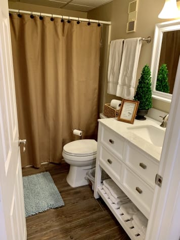 Guest bathroom with access from guest bedroom and hallway