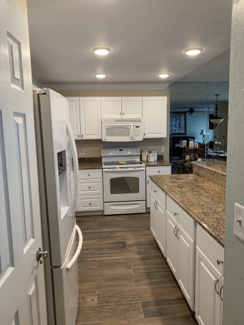 A view entering the kitchen from the hallway