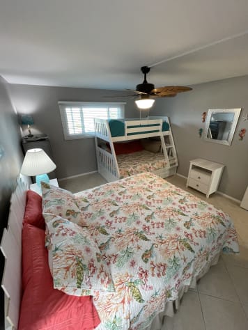 Large 2nd bedroom with queen bed and twin over full size bunk bed.