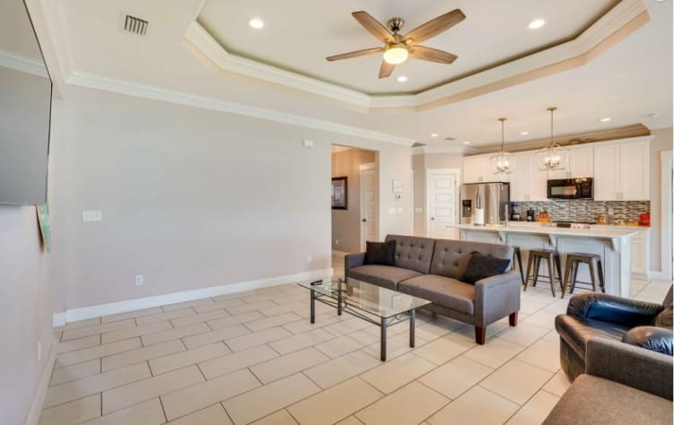 The great room is the perfect gathering place for movies and conversation