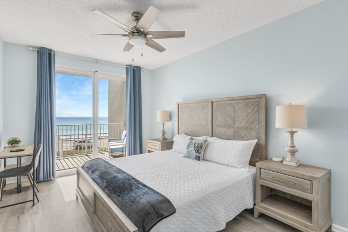 Primary bedroom - all new furniture, King bed, Smart TV, desk and chair, and best of all, GULF VIEWS!