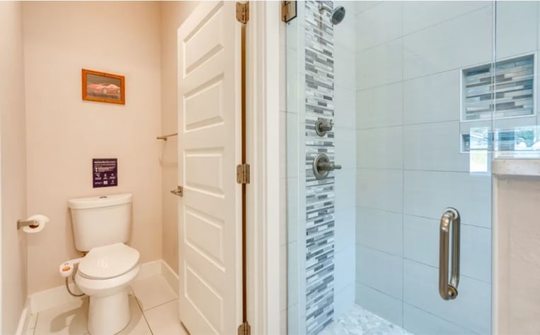 The Executive Suite has a private bathroom with 2 shower sprayers and a bidet