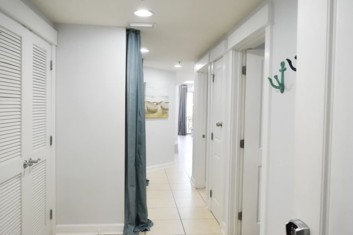 View from the entrance.  Bunk area privacy blackout curtains visible on the left
