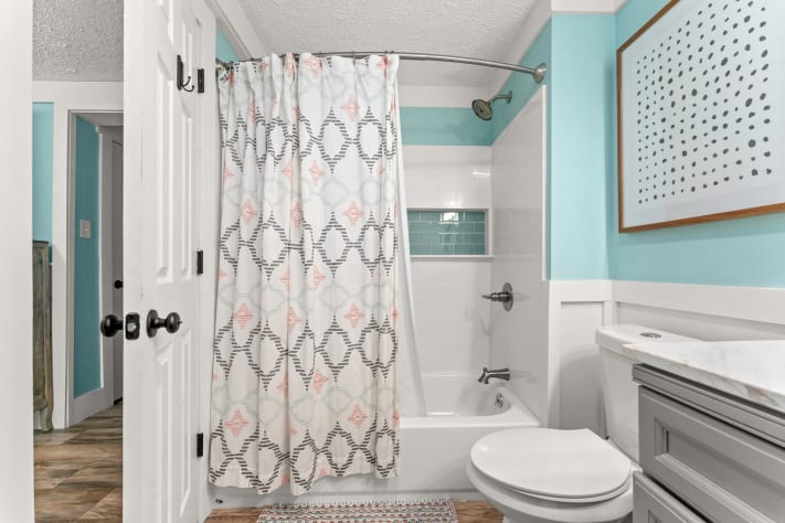 New bath tub/Shower combo in primary bath.