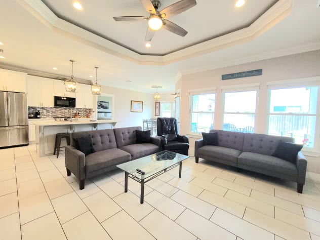 The great room is the perfect gathering place for movies and has 2 futons