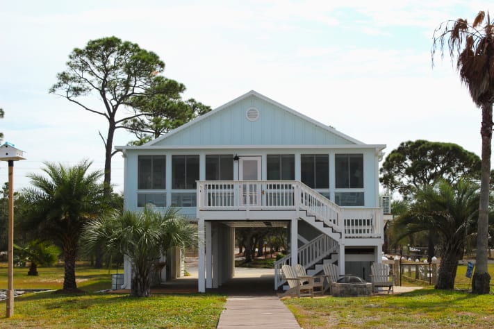 Back view of house. Deck overlooks the bay!