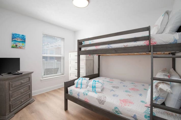 2nd floor twin over full bunk with tv. Directly across hall from queen bedroom. 