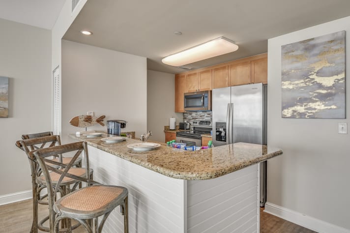 The updated kitchen has granite countertops, stainless steel appliances, and is fully stocked with more than the basics (coffee/tea bar, oils/spices, Tupperware, plenty of pots/pans/cookware) so you and your group can prepare delicious Gulf front meals!
