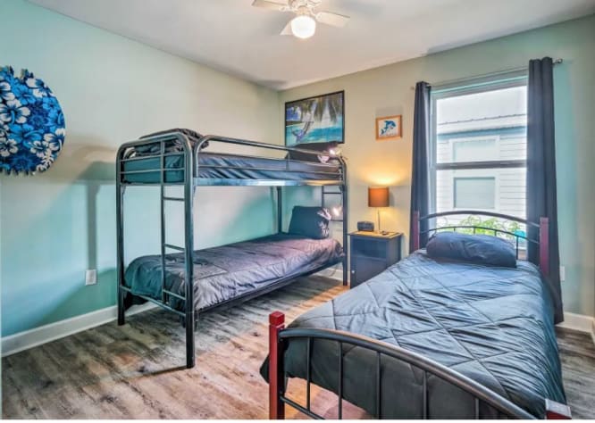 Club Shark Tank has 3 twin beds and a smart TV