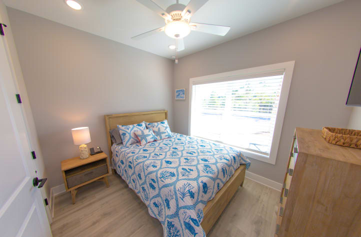 Queen bed in front room