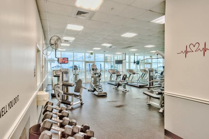 Large, well appointed fitness center (treadmills, stationary bikes, ellipticals, weight machines, and free weights) at Majestic Sun with Pool and Gulf view