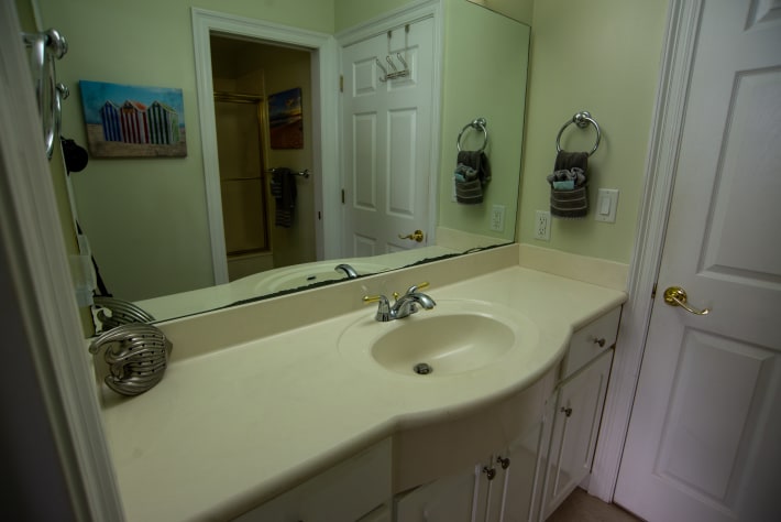 Sink space of guest bath. Walks through from the bedroom to the dining area. 