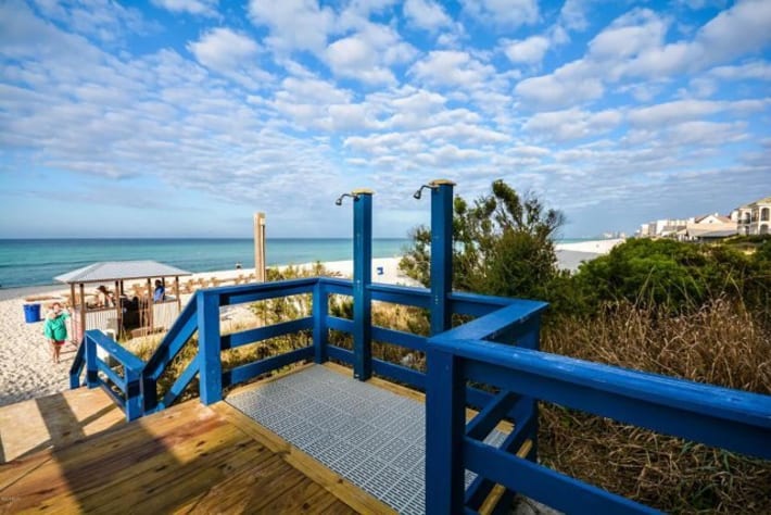 Beach walkover with outdoor showers and easy access to the white sand shoreline