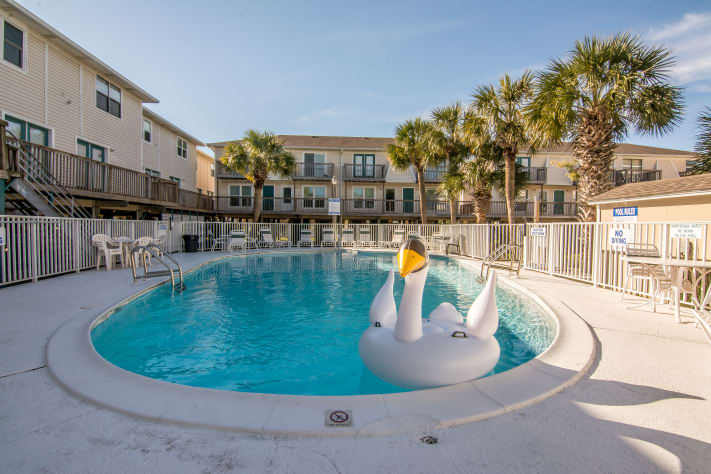 Pool View  - Condo is First Set of Doors On Left