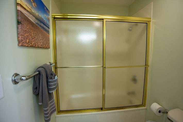 Guest bath arranged w separate space for bathing &amp; business; &amp; walk-through sink