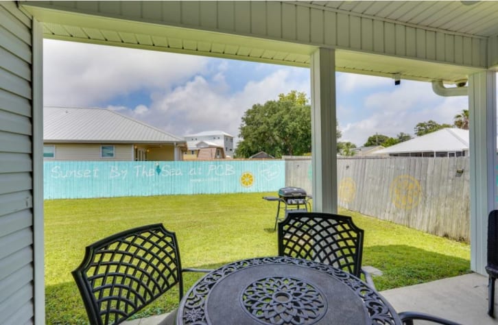 Front and rear covered porches, plus dining area for 4 and a grill