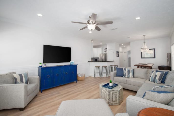 Elegant family room with 65&rdquo; smart tv. 