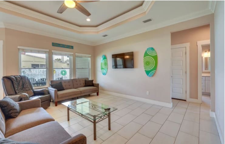 The great room is the perfect gathering place for movies and has 2 futons