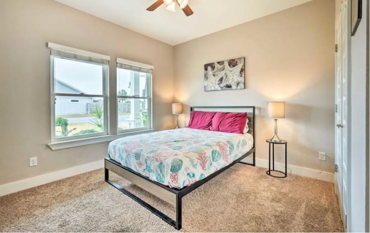The Enchantment Of The Sea room has a queen bed and smart TV