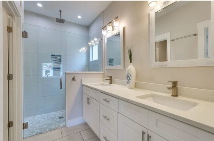 The Executive Suite has a private bathroom with 2 shower sprayers and a bidet