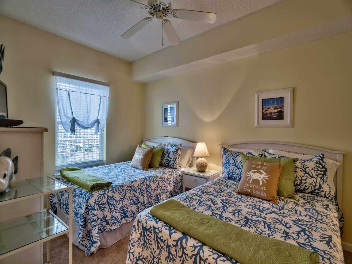 Kids room with attached bath two full beds, TV