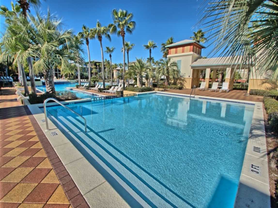 We are one of twelve homes that sit right on the multi level lagoon pool deck with your own gate