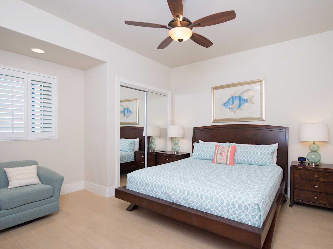 Second guest bedroom includes King bed with private bathroom with walk in shower