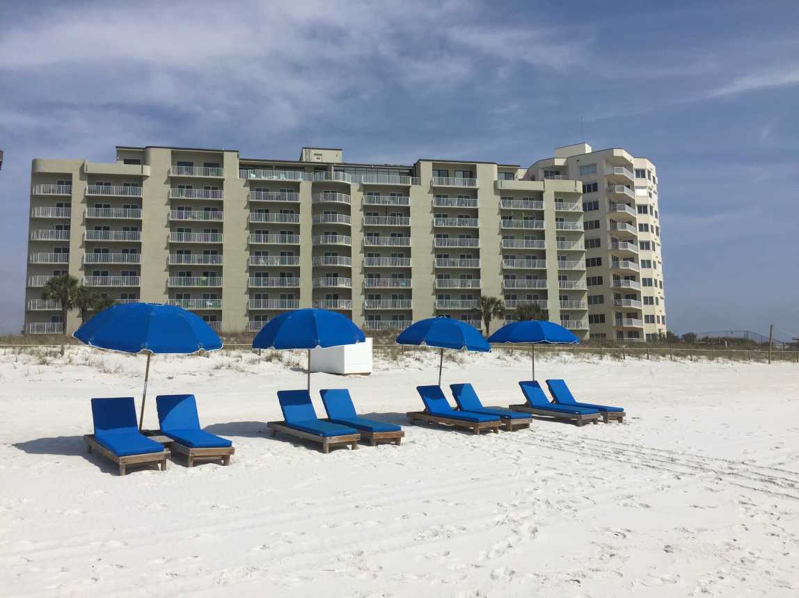 FREE (PREPAID) Beach chair/umbrella setups for your week in FLIP FLOPS ON THE MOON!