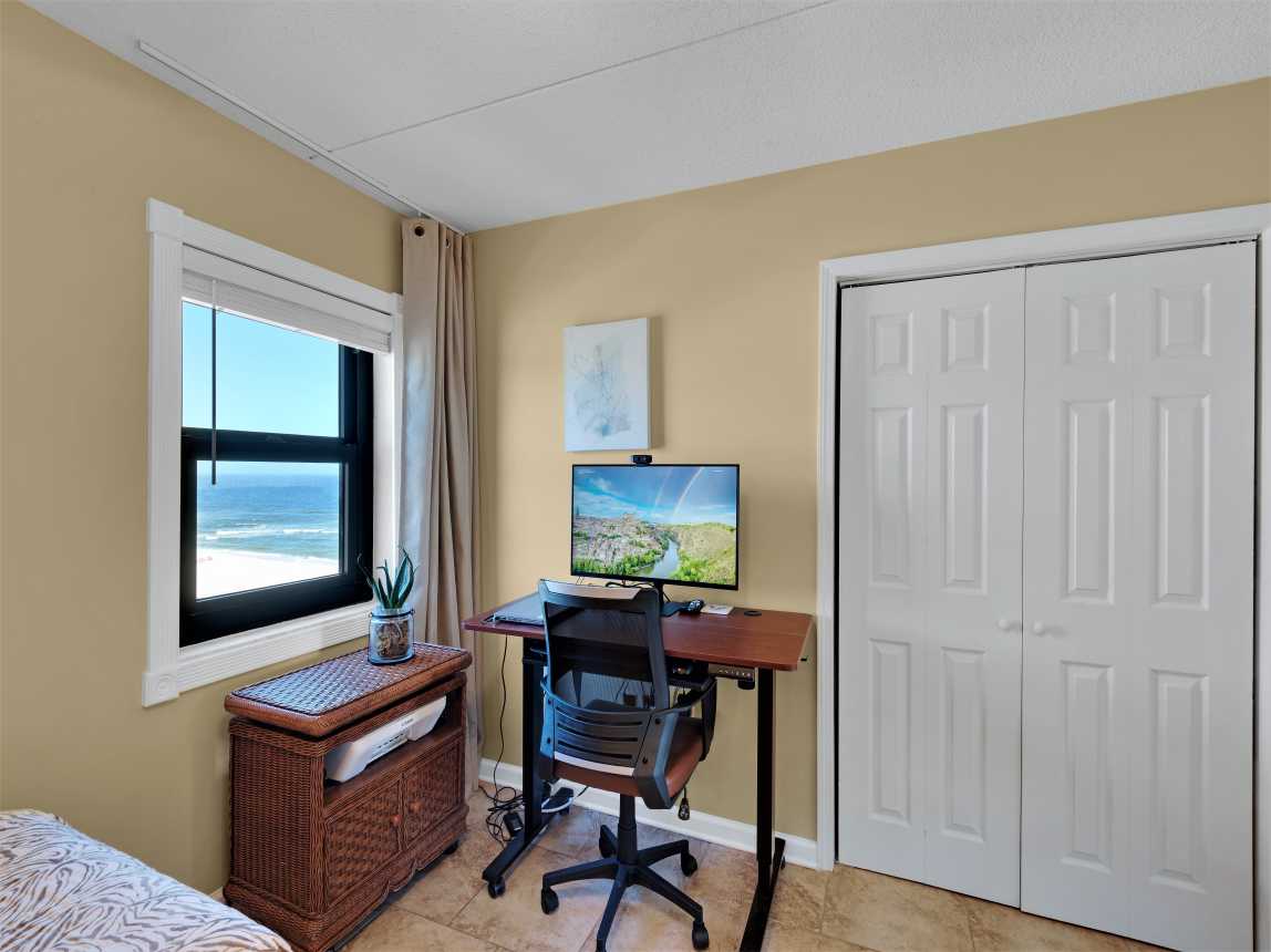 Twin BR adjustable height desk w/ combo tv/gaming monitor w/view.