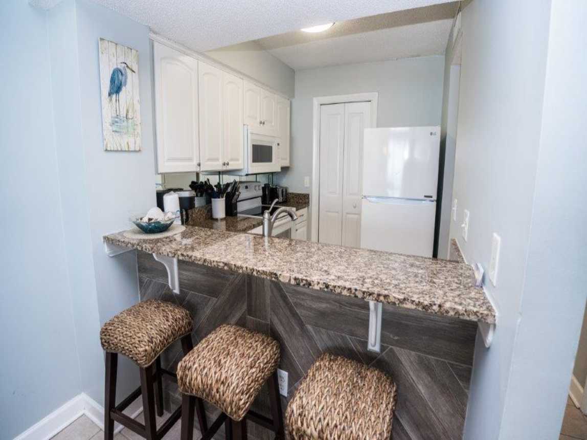 Kitchen with Bar Seating for 3