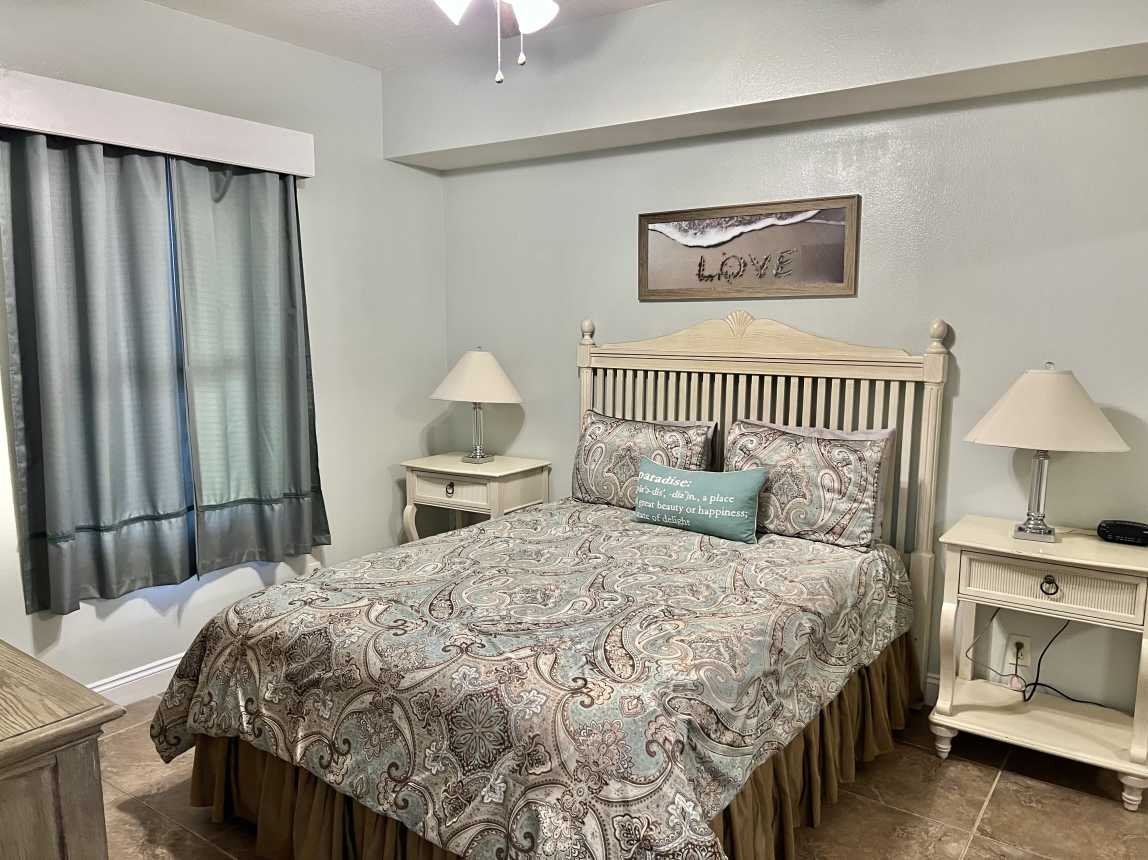 Queen Guestroom with Wall Mounted Smart TV, Double mirrored closet, Bath access.