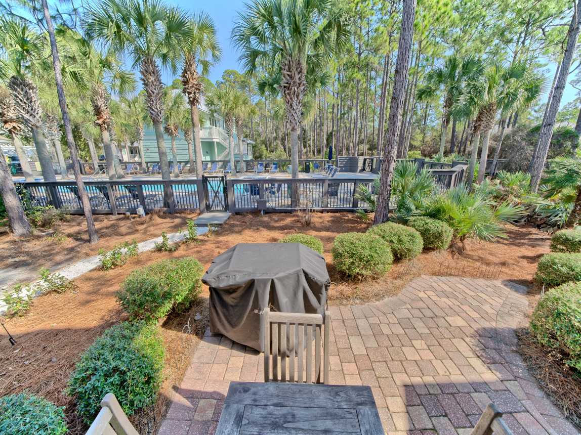 Patio, steps away from gate to pool!