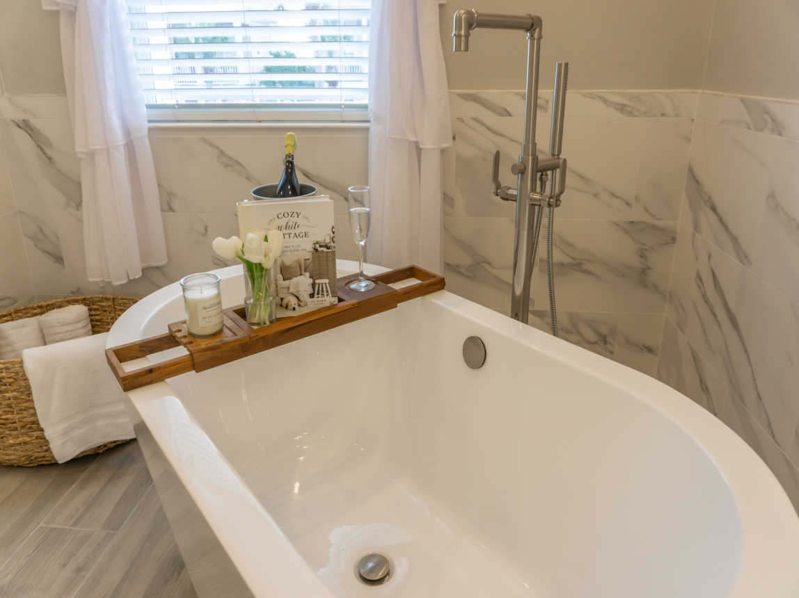 Relax in the tub with your favorite beverage, you deserve it !  