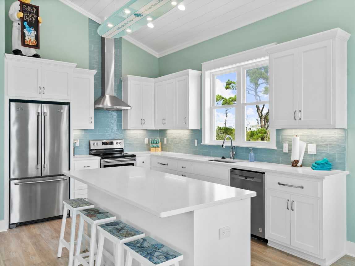 Kitchen loaded with amenities and our Surf Board island lighting!